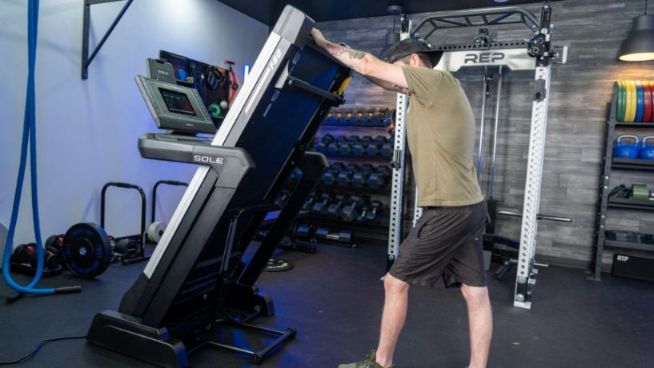 man moving sole f80 treadmill
