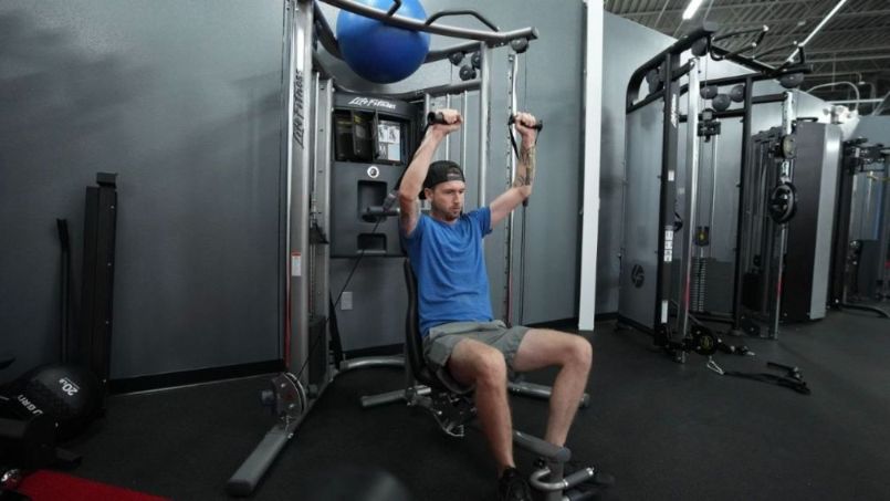sam using life fitness functional trainer g7 home gym