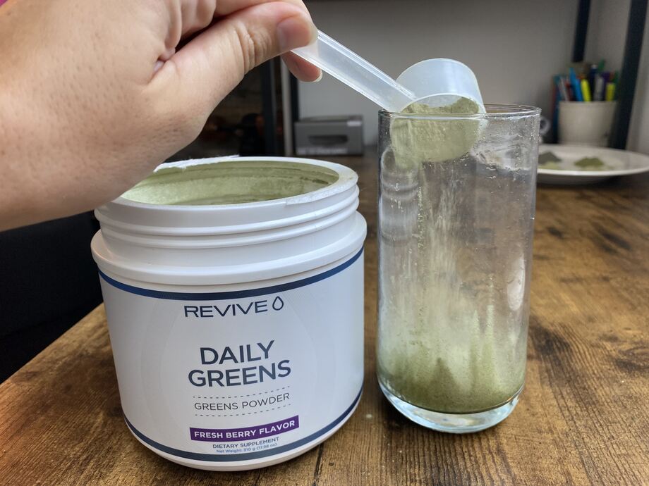 Scooping Revive Daily Greens Into Cup 5