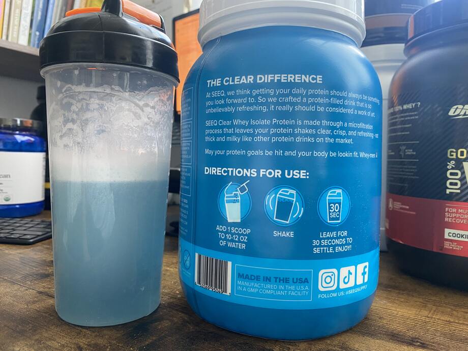best-tasting fruity protein powder seeq whey protein, a very blue liquid in a clear glass