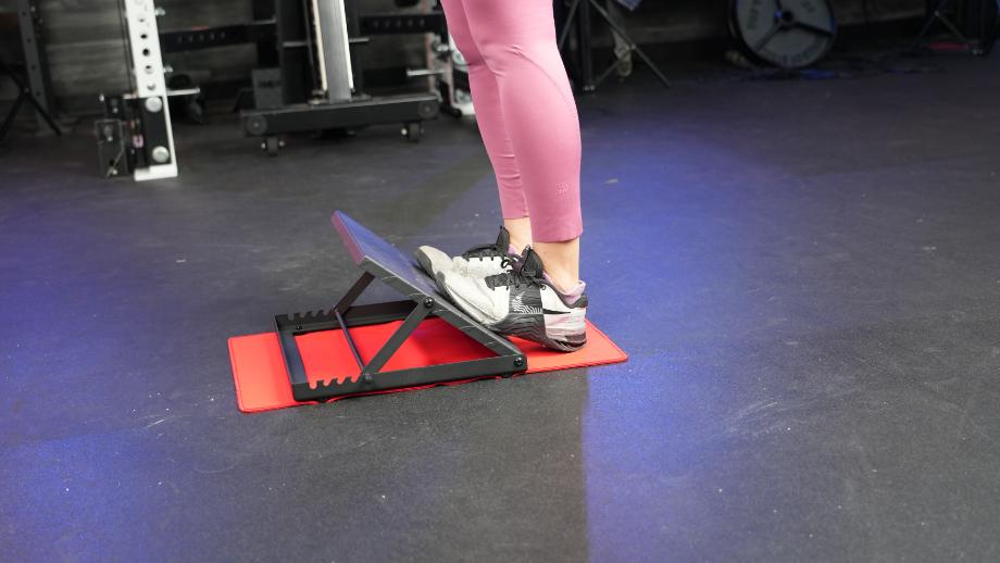 Calf stretch using the Shogun VMO Slant Board