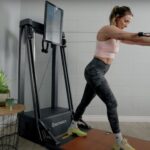 Side view of Lindsay Scheele using the Echelon Strength Home.