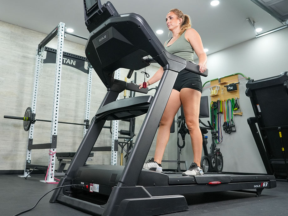 Woman walking on the Sole F63 treadmill.