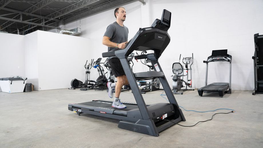 Coop running on the Sole F63 treadmill, one of the best incline treadmills 