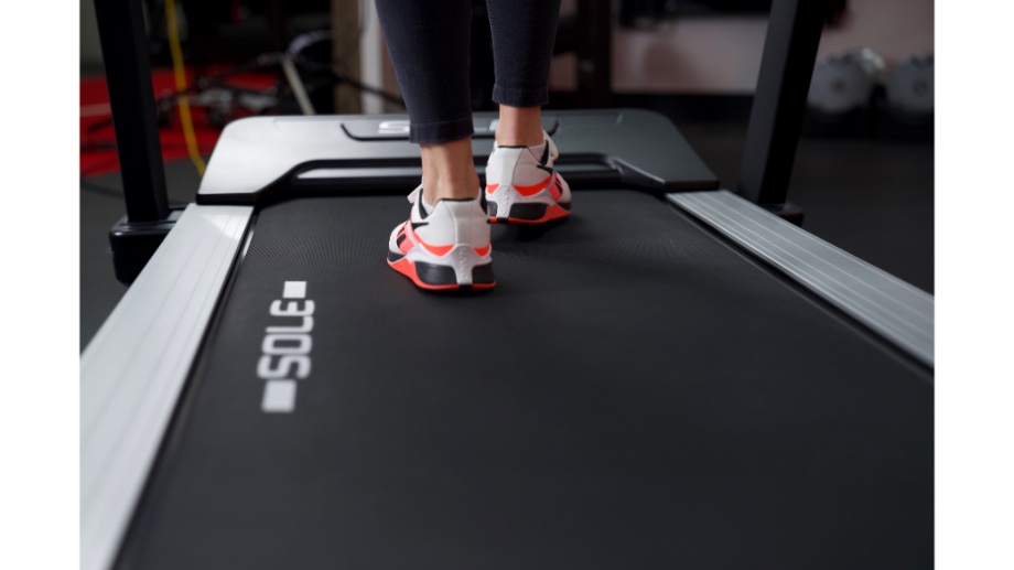 woman walking on sole fitness tt8 treadmill