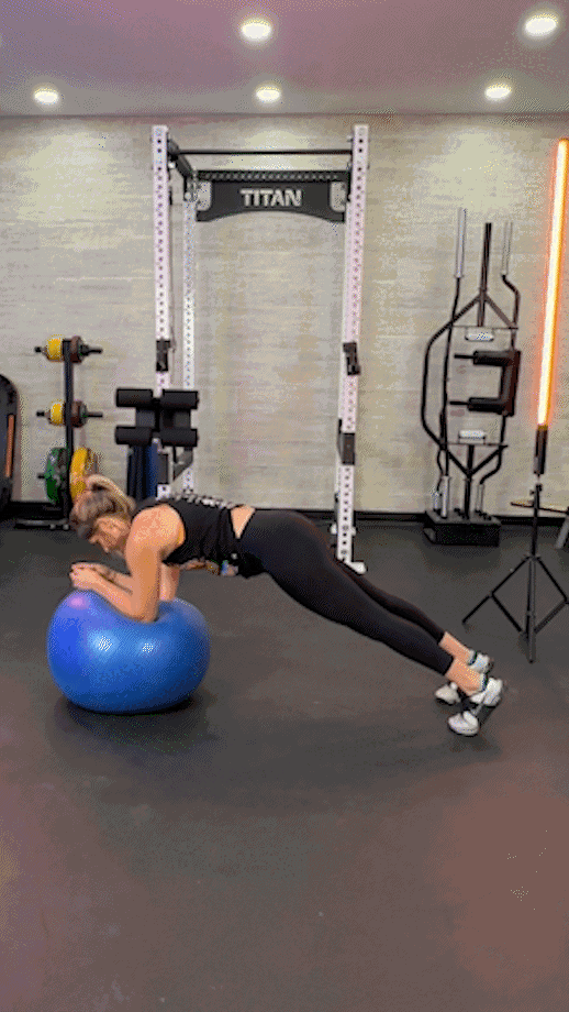 woman doing stability ball plank