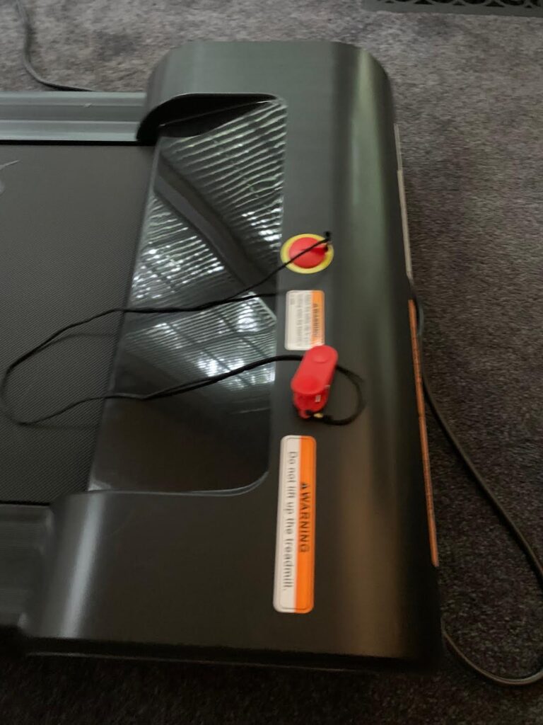 The safety strap is shown for the Sunny Health and Fitness Under Desk Treadmill.
