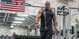 The Rock walking through his home gym