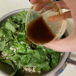 Heating up a lunch from the Thistle meal delivery service.