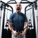 Man using the Titan Fitness Functional Trainer