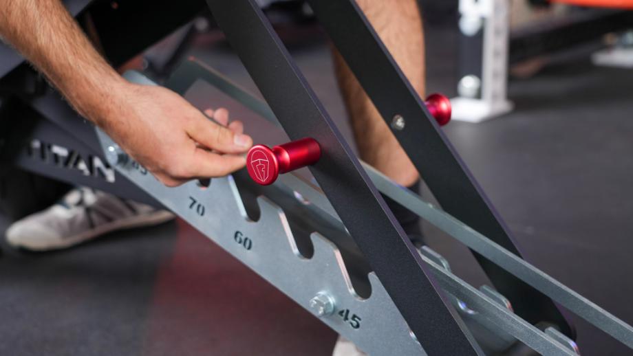 The anodized knobs of the ladder system on the TITAN Series Adjustable Bench