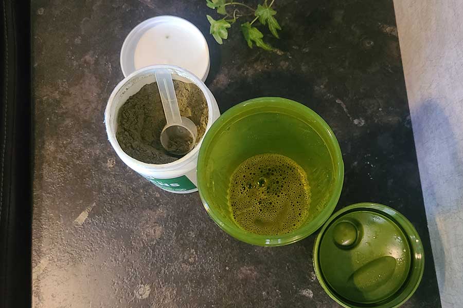 Top View Of Nested Naturals Super Greens In A Shaker Bottle