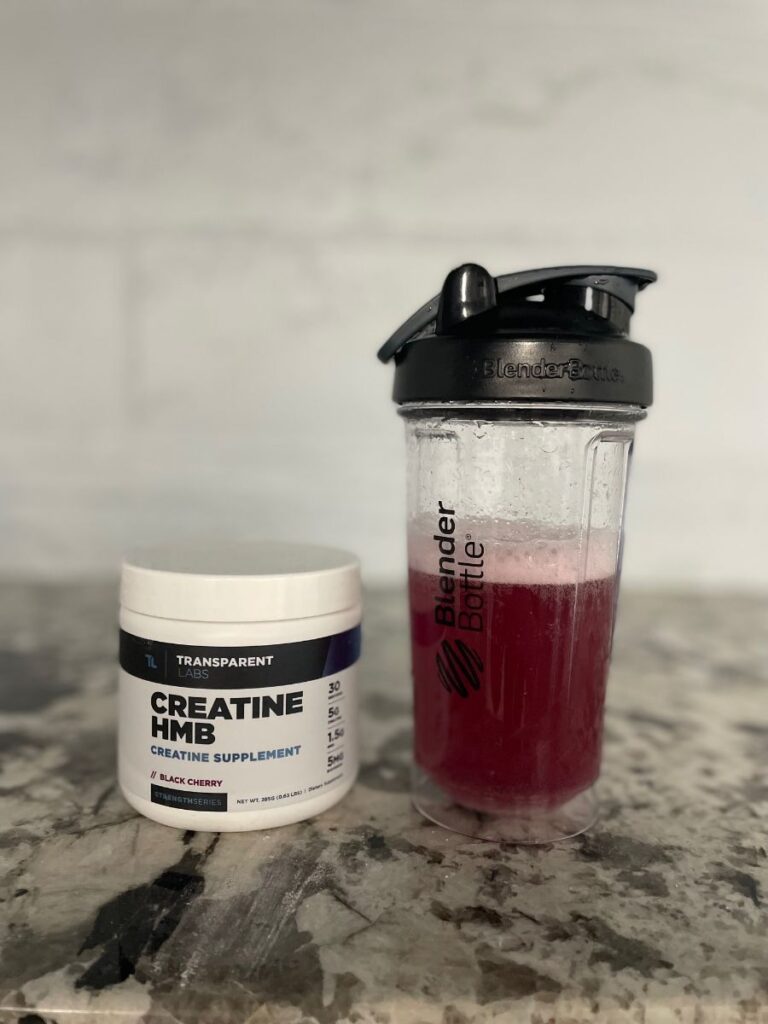 Transparent Labs Creatine HMB in Sour Grape in a shaker