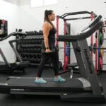 Woman doing a treadmill arm workout