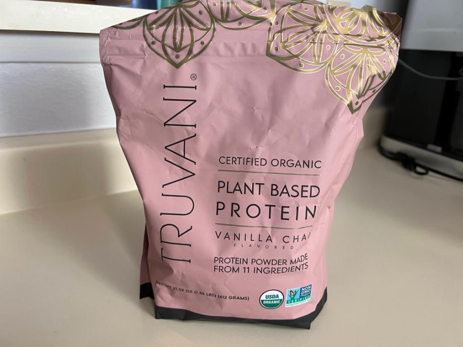 A Vanilla Chai flavored bag of Truvani Protein Powder is shown