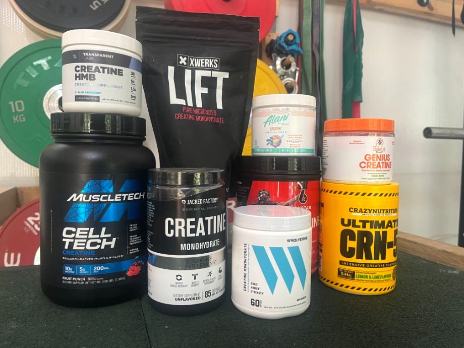 An image of creatine stacked up in a gym to represent types of creatine