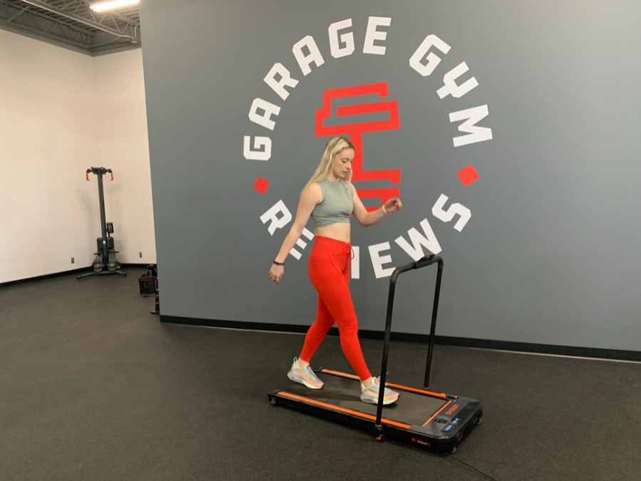 Caroline on the UREVO 2 in 1 treadmill