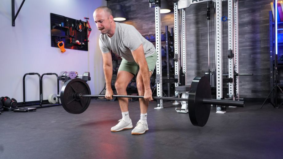 Man using the REP Hades Deadlift Bar