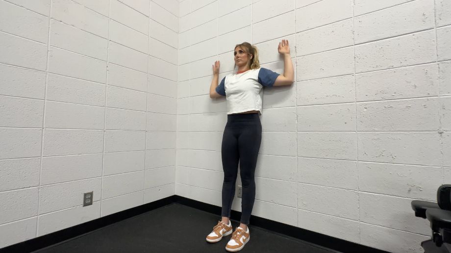 woman doing wall slides