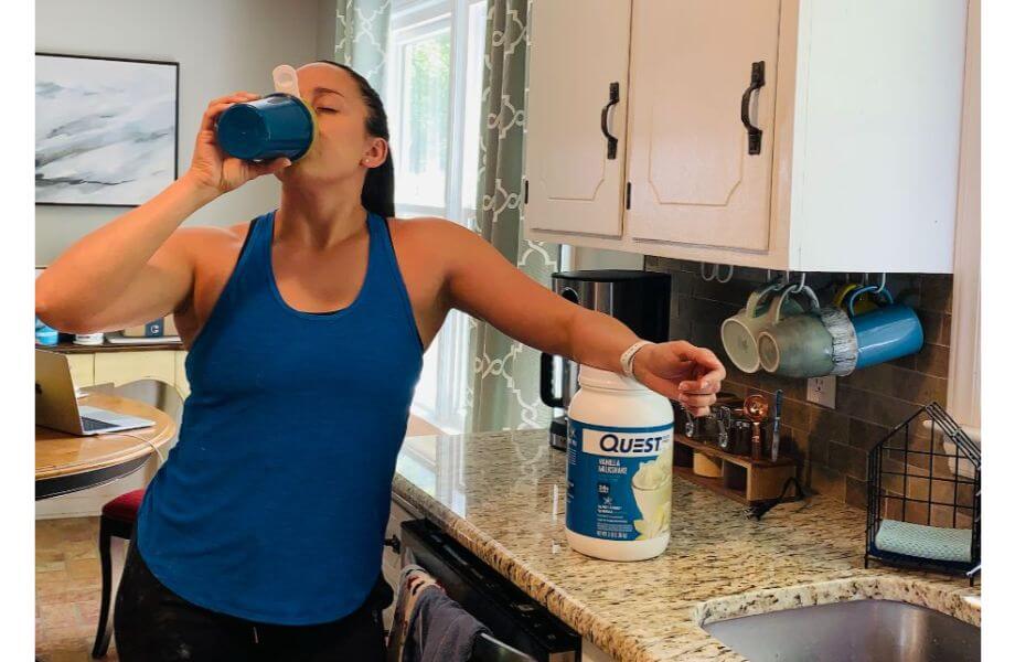 woman drinking quest protein