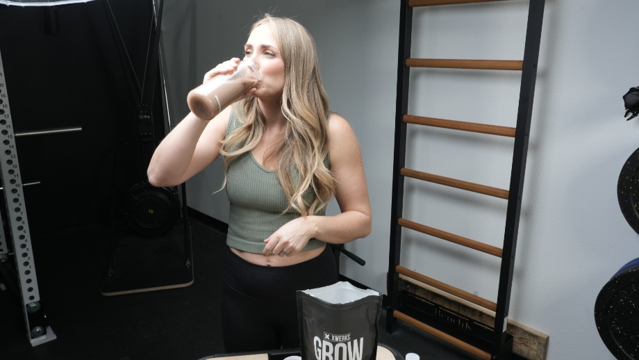 Lindsay Scheele, CPT, drinking XWERKS Grow.