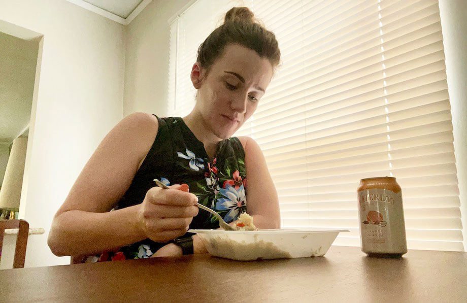 Woman Eating Territory Meal