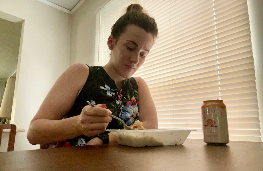 woman eating a Territory meal