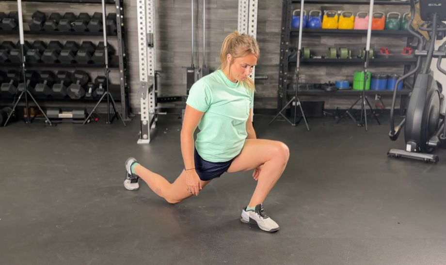 woman holding a deep lunge stretch
