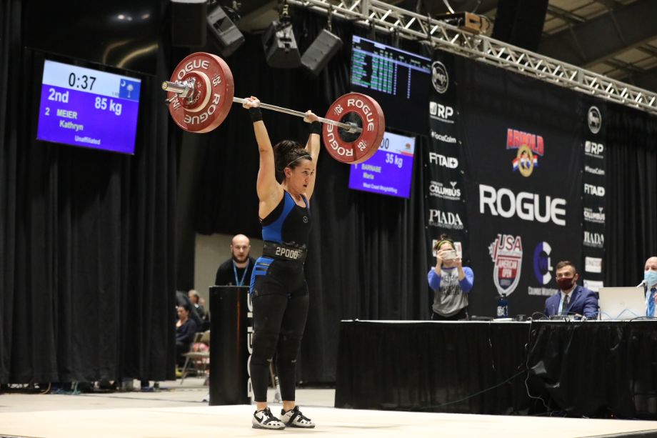 Woman lifting on Rogue Pyrros Bar