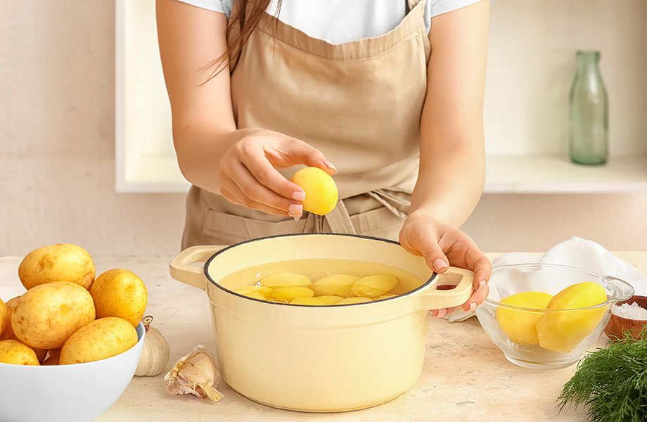 woman-preparing-potatoes