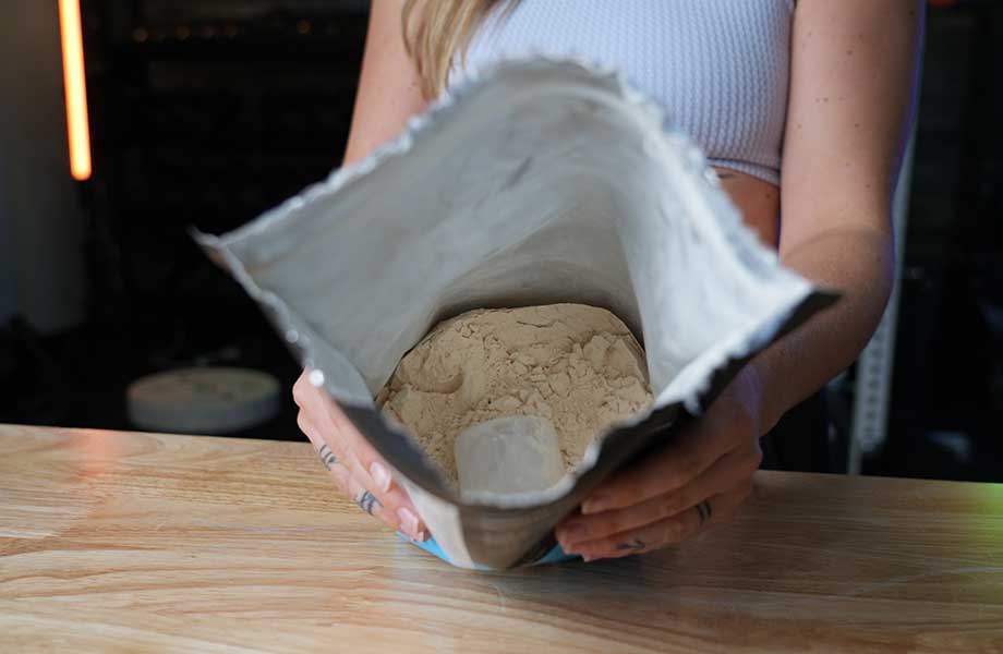 Looking into an open bag of Legion Plant+ Protein Powder