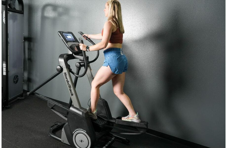 woman using the best nordictrack ellipticals fs14i