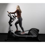woman using NordicTrack SE9i