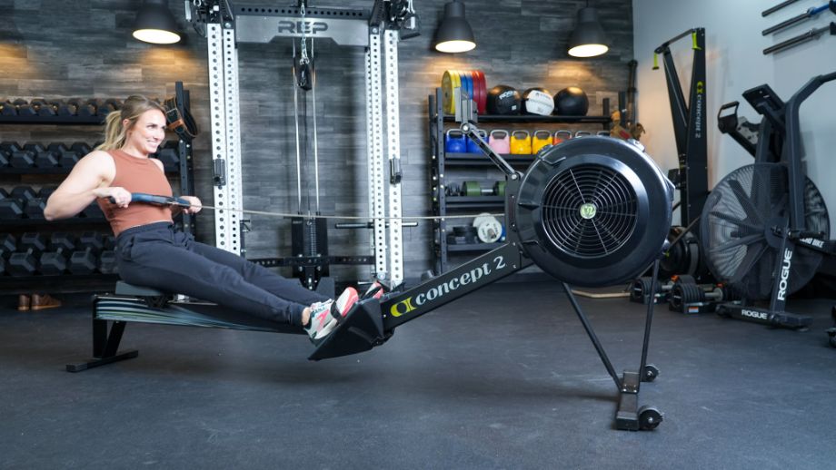 Woman using Concept2 RowErg