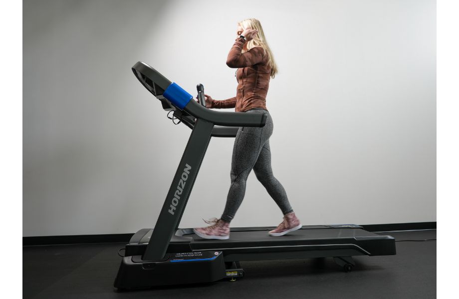 woman walking horizon 7.0 treadmill, one of the best incline treadmills 