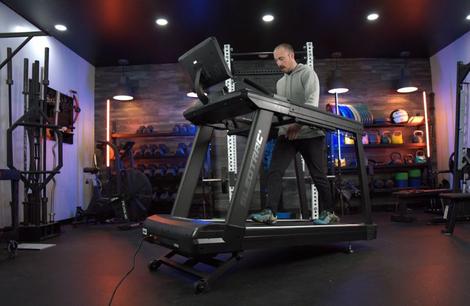 Xebex ST-6000 treadmill set to an incline with man walking normally