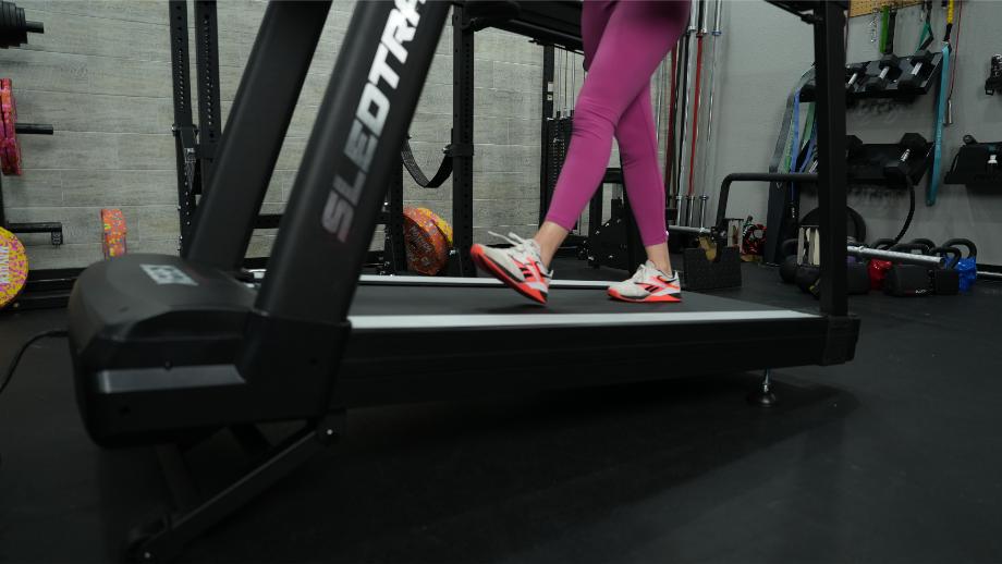 Xebex ST-6000 treadmill set to an incline with woman walking normally